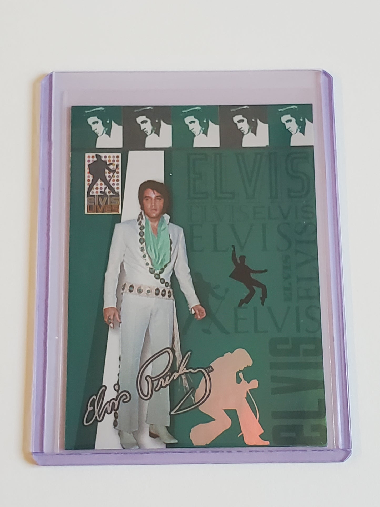 Elvis Presley 2006 Press Pass Elvis Lives Fashions Foil '71 Vegas White/Turqouise Jumpsuit 7/12